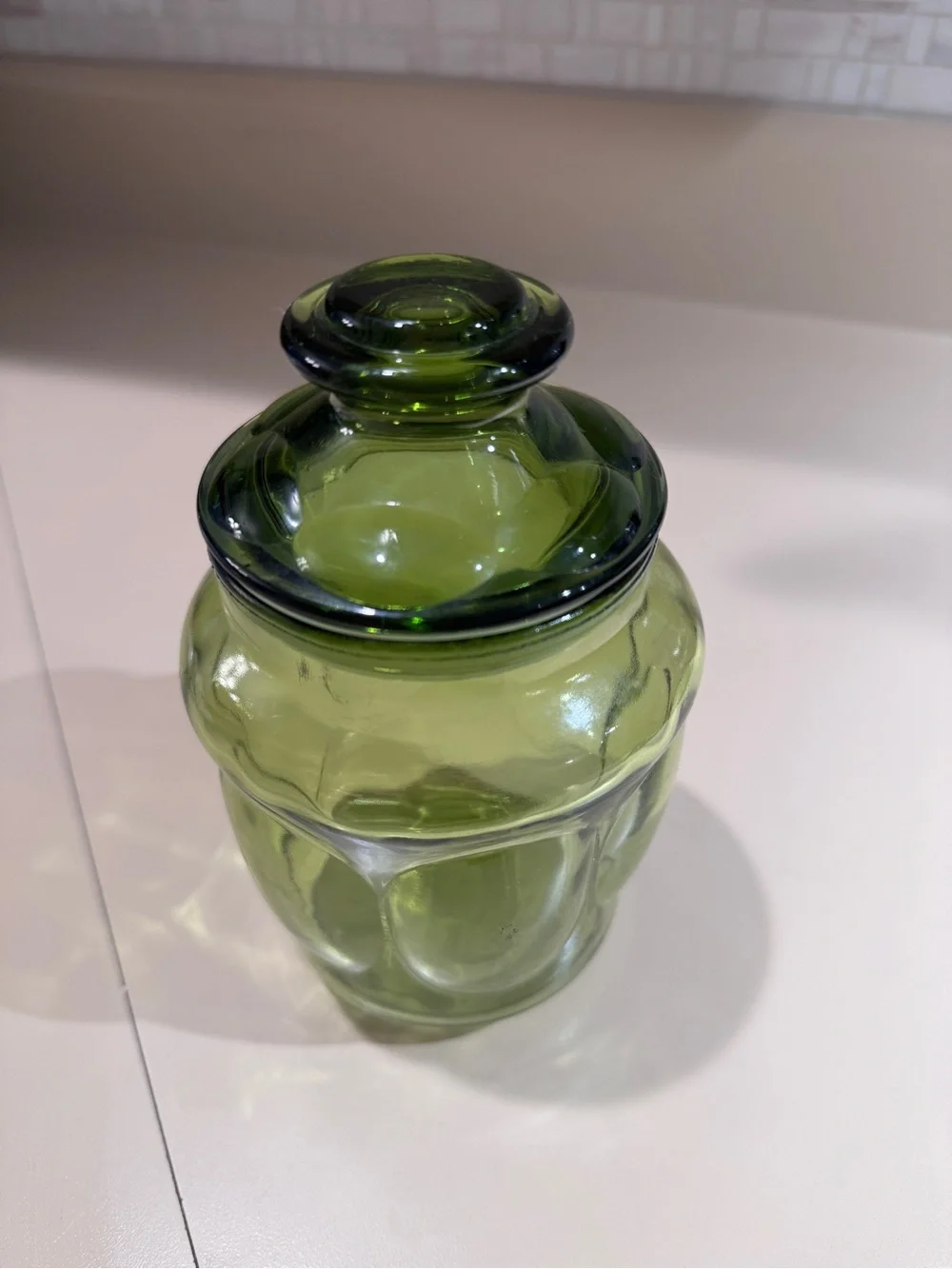 Vintage small green glass jar with lid